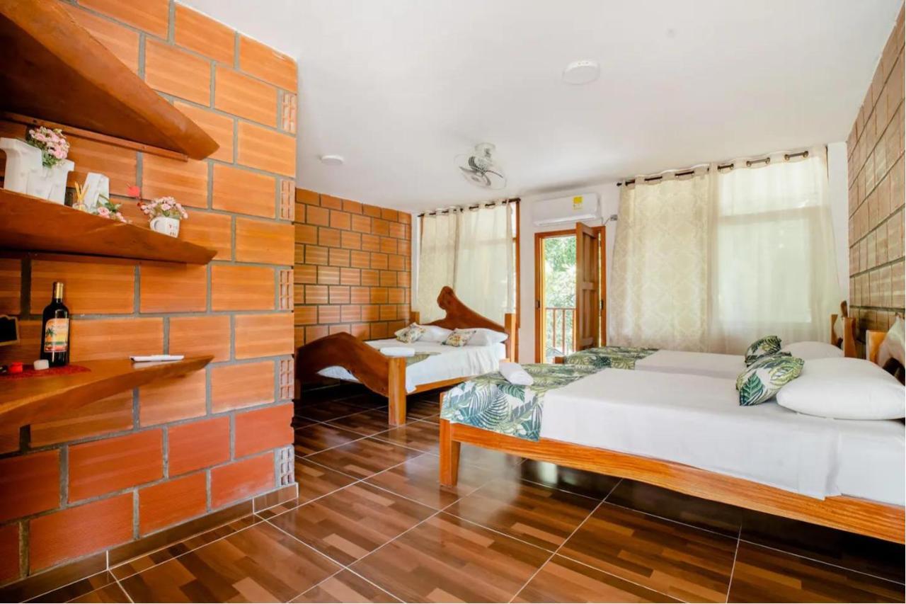 Arca Tayrona Restaurant & Hostal 洛斯纳兰霍斯 外观 照片