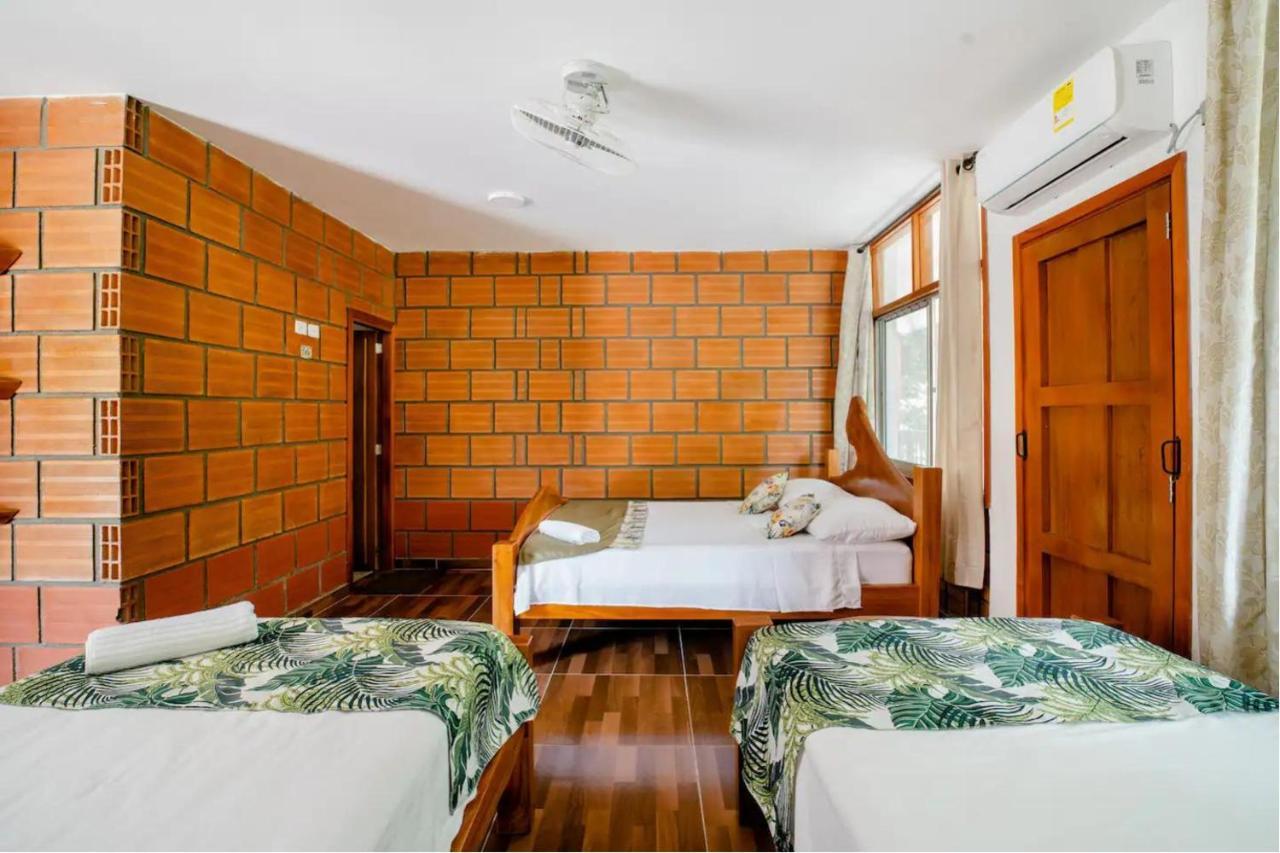 Arca Tayrona Restaurant & Hostal 洛斯纳兰霍斯 外观 照片