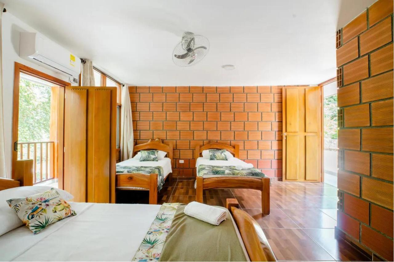 Arca Tayrona Restaurant & Hostal 洛斯纳兰霍斯 外观 照片