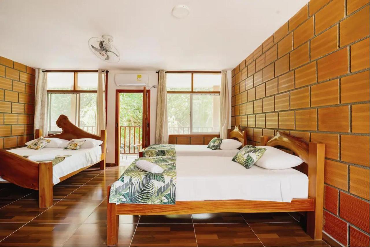 Arca Tayrona Restaurant & Hostal 洛斯纳兰霍斯 外观 照片